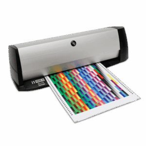 X-Rite i1iSis 2 spectrophotometer measuring A4 test charts for ISO-compliant color management