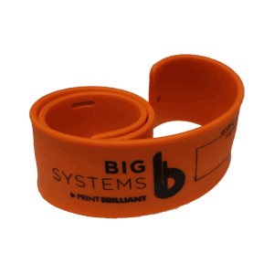 Wide format printer media band holding partial media rolls without tape for clean and organized storage